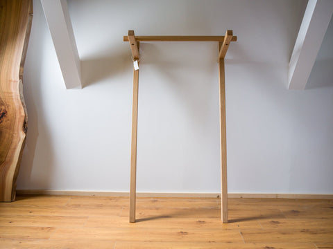 Oak leaning clothes rack