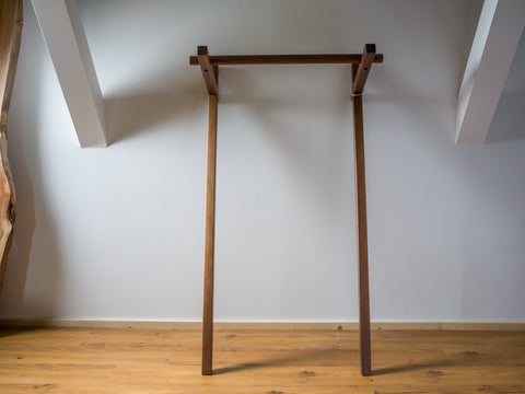 Walnut leaning clothes rack